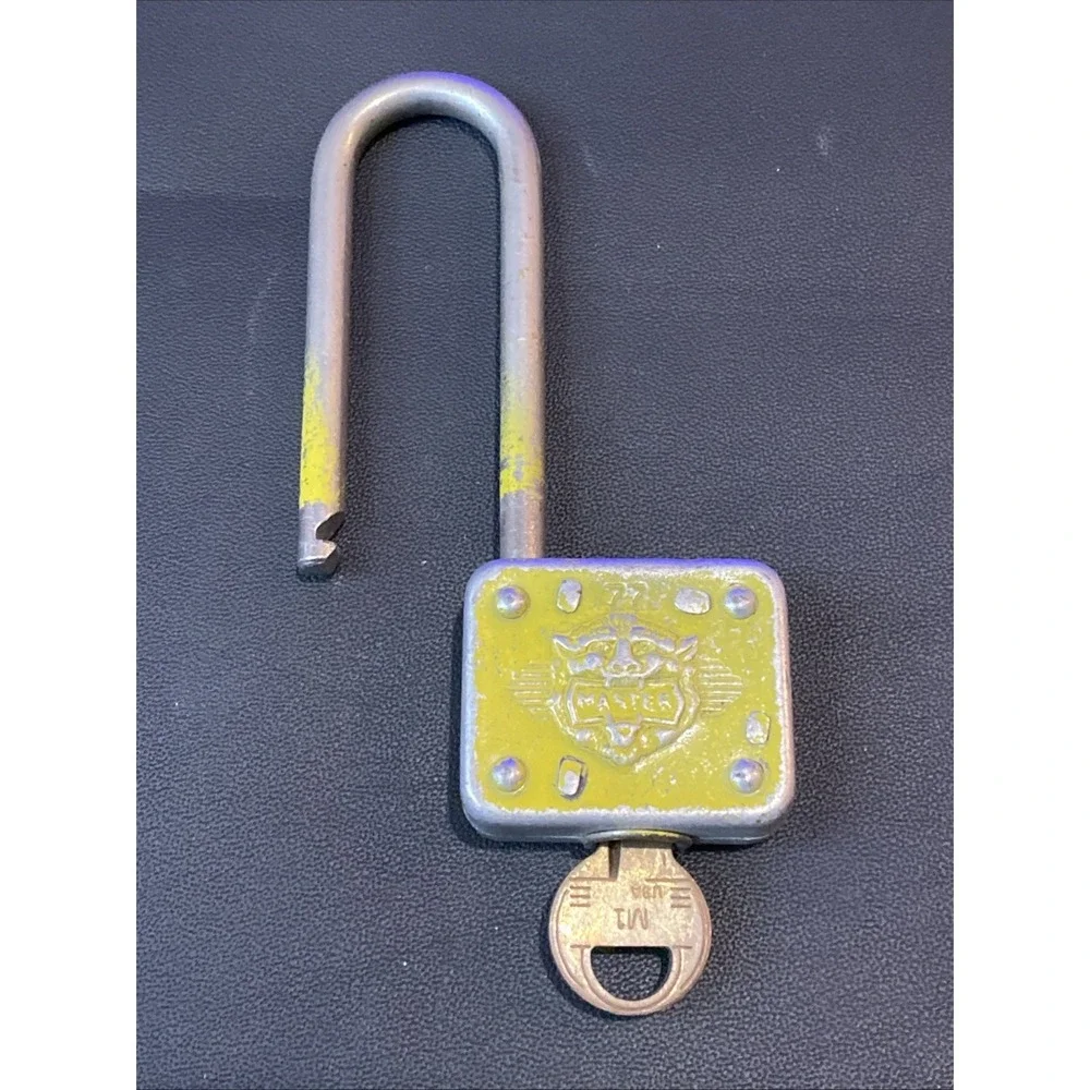 Vintage MASTER LOCK Padlock Lion Face Long Shackle 77 Works w/ Key Yellowish Clr